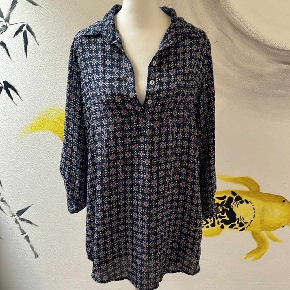 About a girl mini dress. Size small. Silky soft. Abalone buttons.